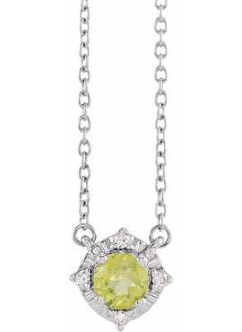 14K Yellow Gold Natural Mozambique Garnet & .04 CTW Natural Diamond Halo-Style 18