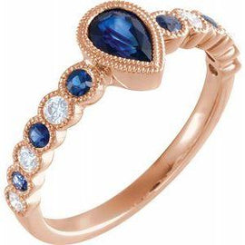 Blue Sapphire & 1/6 CTW Diamond Ring