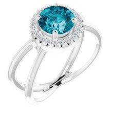 Load image into Gallery viewer, London Blue Topaz &amp; 1/10 CTW Diamond Halo-Style Ring
