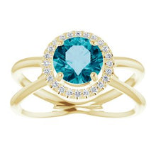 Load image into Gallery viewer, London Blue Topaz &amp; 1/10 CTW Diamond Halo-Style Ring
