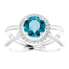 Load image into Gallery viewer, London Blue Topaz &amp; 1/10 CTW Diamond Halo-Style Ring
