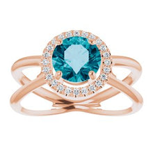 Load image into Gallery viewer, London Blue Topaz &amp; 1/10 CTW Diamond Halo-Style Ring
