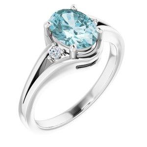 Sky Blue Topaz & .05 CTW Diamond Ring